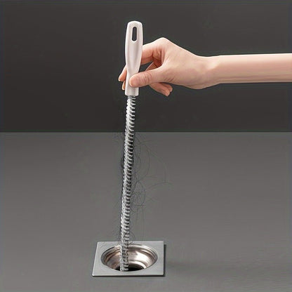 Déboucheur-canalisation-douche-salle-de-bain-brosse-entretien
